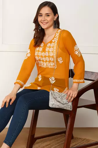 Women floral embroidered georgette orange kurti