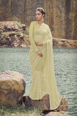 Light Green Beads And Cutdana Work Net Saree With Satin And Net Blouse 1