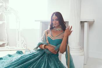 Beautiful Teal Net With Embroidered And Thread Zari Sequence Wedding Lehenga Choli 4