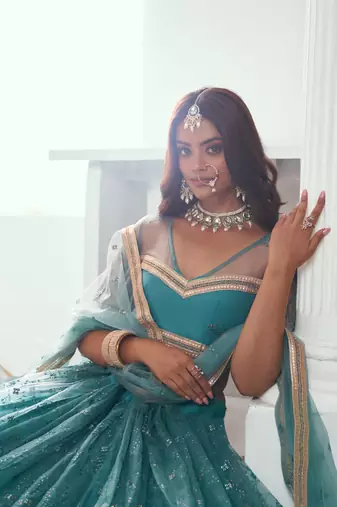 Beautiful Teal Net With Embroidered And Thread Zari Sequence Wedding Lehenga Choli