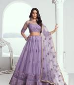 Elegance Lavender Net With Embroidered And Thread Zari Sequence Function Wear Lehenga Choli