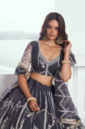 Appealing Dark Gray Net With Embroidered And Thread Zari Sequence Party Wear Lehenga Choli