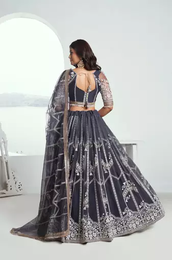 Appealing Dark Gray Net With Embroidered And Thread Zari Sequence Party Wear Lehenga Choli