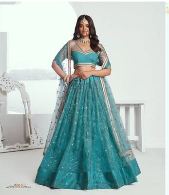 Emerald Green Heavy Embroidery Net Semi Stitch A Line Lehenga With Blouse 1