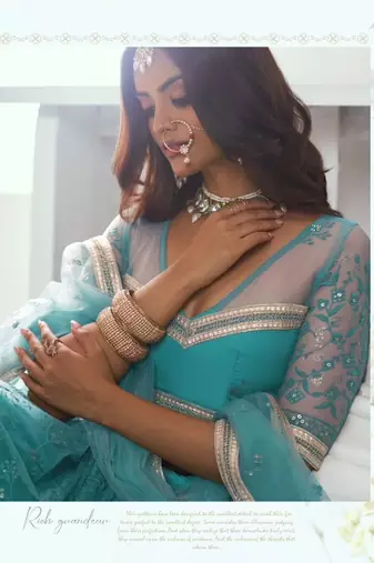 Emerald Green Heavy Embroidery Net Semi Stitch A Line Lehenga With Blouse
