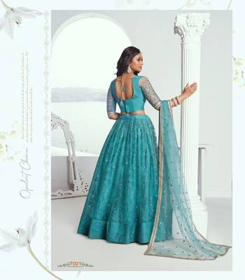 Emerald Green Heavy Embroidery Net Semi Stitch A Line Lehenga With Blouse 4