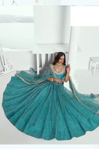 Emerald Green Heavy Embroidery Net Semi Stitch A Line Lehenga With Blouse