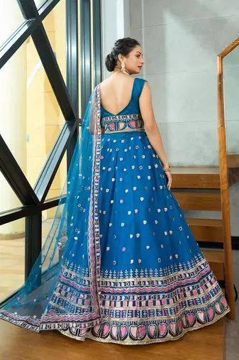 Turquoise Net Sequance Embroidery Work Heavy Graceful Looks Beautiful Wedding Ceremony Lehenga Choli