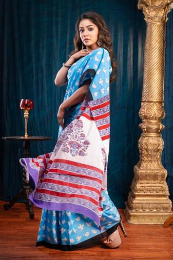 Blue pure bagru malmal cotton saree with offwhite bird motifswith running blouse piece