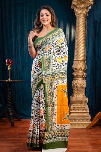 Offwhite pure bagru malmal cotton saree with green jungle motifswith running blouse piece