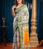 Offwhite pure bagru malmal cotton saree with green jungle motifswith running blouse piece