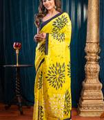 Yellow pure bagru malmal cotton saree with floral motifs and black borderwith running blouse piece