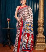 Offwhite pure bagru malmal cotton saree with red floral jaal and borderwith running blouse piece