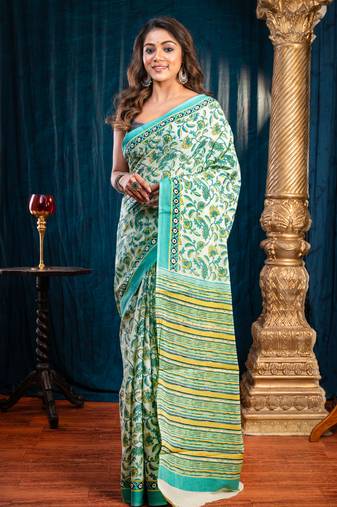 Green pure bagru malmal cotton saree with multicolor floral motifswith running blouse piece