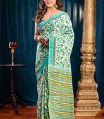 Green pure bagru malmal cotton saree with multicolor floral motifswith running blouse piece