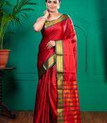 Red aura silk saree with contrasting green and golden zari borderwith running blouse piece