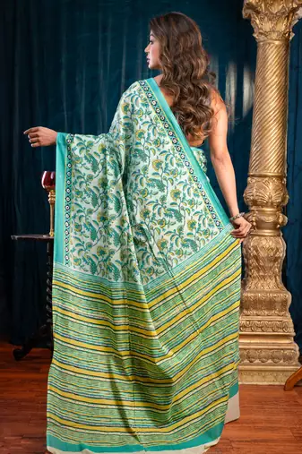 Green  bagru malmal cotton saree with multicolor floral motifswith running blouse piece