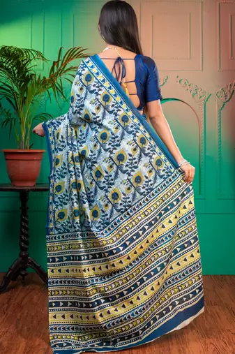 Blue  bagru malmal cotton saree with multicolor floral motifswith running blouse piece