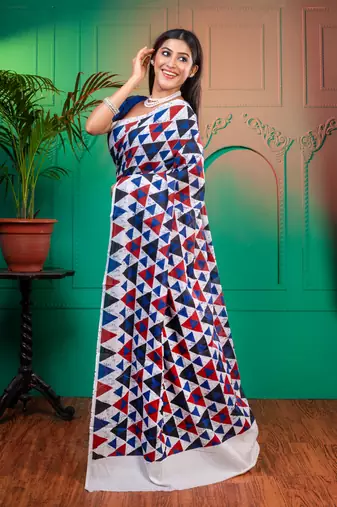 Blue  bagru malmal cotton saree with red and blue triangular motifswith running blouse piece