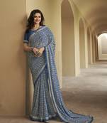 Blue Prachi Georgette silk bland all over printed & Lace Border saree with Blouse