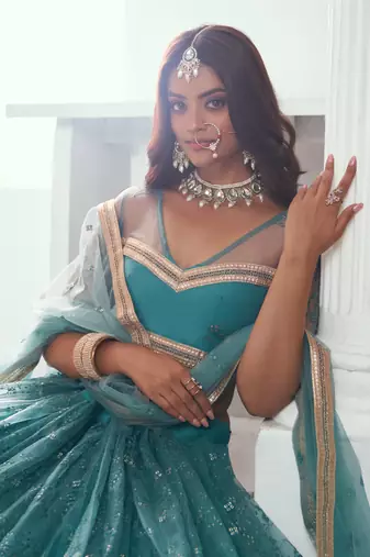RAMA GREEN NET FABRIC LAHENGA WITH SEQUINS AND THREAD EMBROIDERY WORK