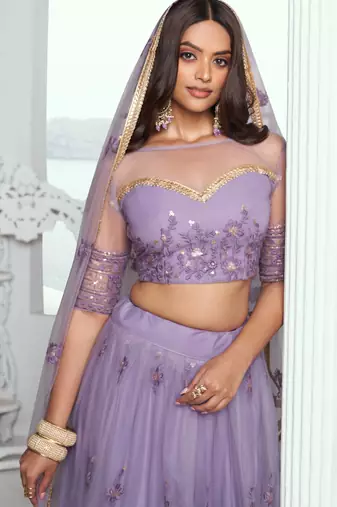 LAVENDER NET FABRIC LAHENGA WITH SEQUINS AND THREAD EMBROIDERY WORK