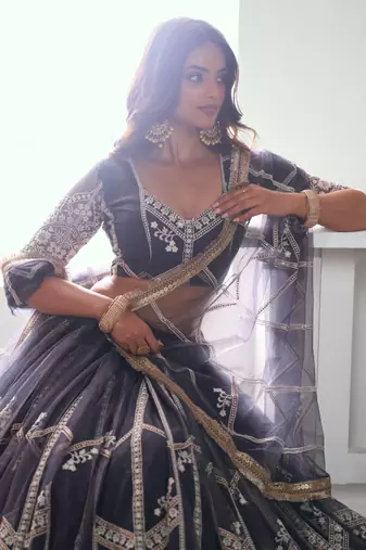 DARK GREY NET FABRIC LAHENGA WITH SEQUINS AND THREAD EMBROIDERY WORK