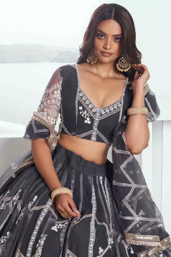 DARK GREY NET FABRIC LAHENGA WITH SEQUINS AND THREAD EMBROIDERY WORK