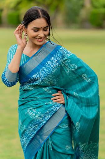 Turquoise silk blend paisley block print golden zari border saree