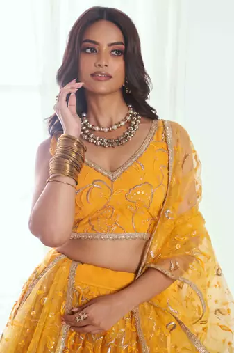 YELLOW NET FABRIC LAHENGA WITH SEQUINS AND THREAD EMBROIDERY WORK