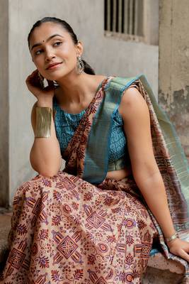 Light peach silk blend ajrakh print golden zari border saree 3