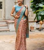 Light peach silk blend ajrakh print golden zari border saree