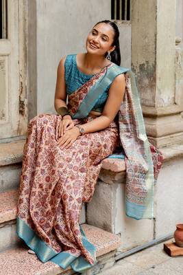 Light peach silk blend ajrakh print golden zari border saree 4