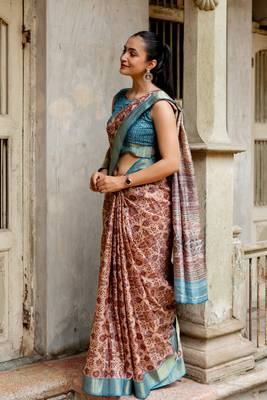 Light peach silk blend ajrakh print golden zari border saree 5