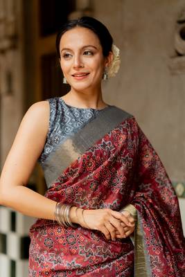 Maroon silk blend ajrakh print golden zari border saree 1