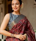 Maroon silk blend ajrakh print golden zari border saree