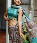 Taupe silk blend geometric print golden zari border saree