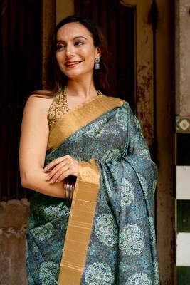 Grey silk blend ajrakh print golden zari border saree 1