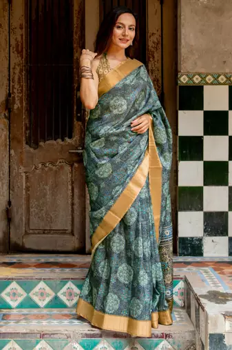Grey silk blend ajrakh print golden zari border saree