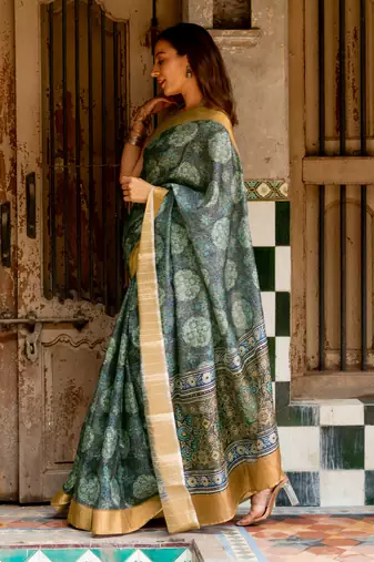 Grey silk blend ajrakh print golden zari border saree