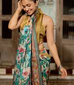 Teal silk blend floral print golden zari border saree