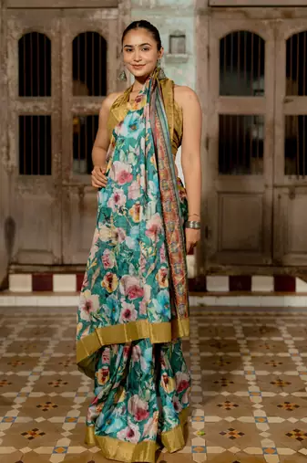 Teal silk blend floral print golden zari border saree