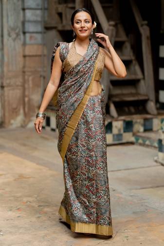 Greyish blue silk blend floral print golden zari border saree