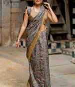 Greyish blue silk blend floral print golden zari border saree