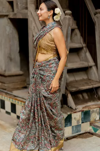 Greyish blue silk blend floral print golden zari border saree