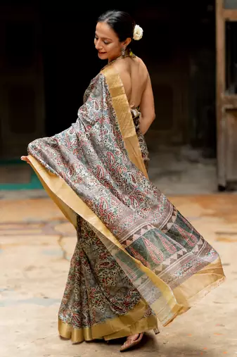 Greyish blue silk blend floral print golden zari border saree