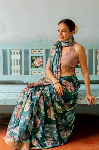 Rama green silk blend floral print golden zari border saree