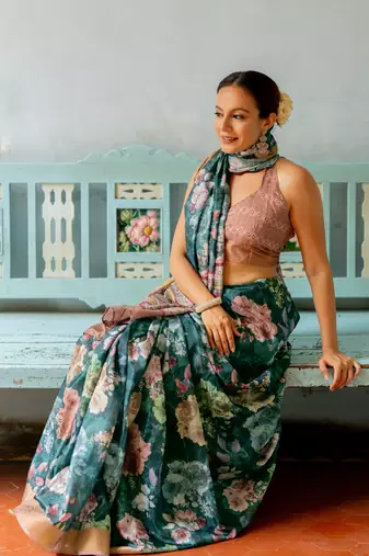 Rama green silk blend floral print golden zari border saree