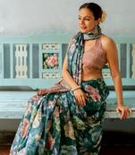 Rama green silk blend floral print golden zari border saree