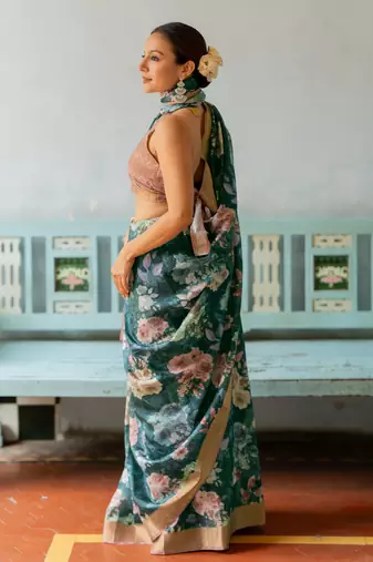 Rama green silk blend floral print golden zari border saree